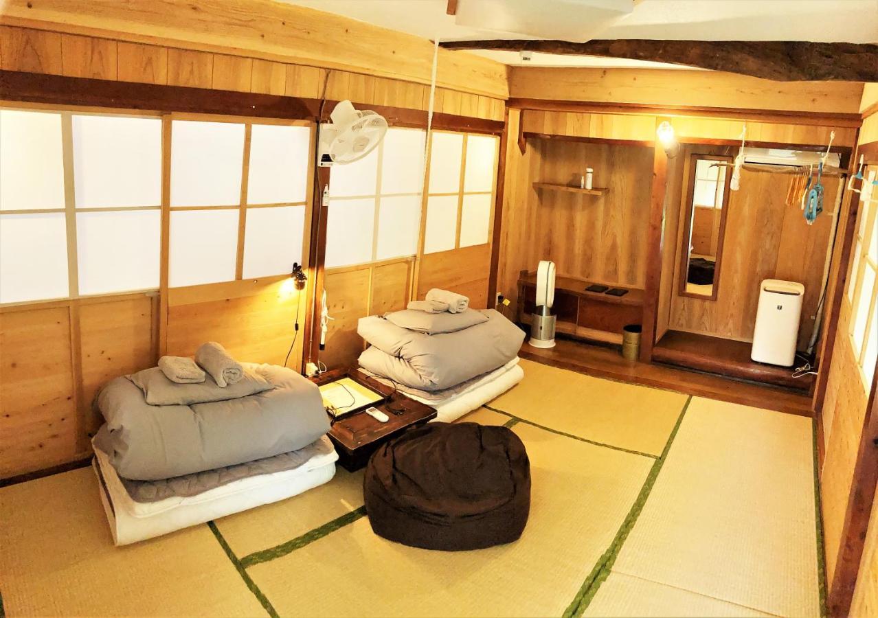 奄美ゲストハウス Hub A Nice Inn Setouchi  Экстерьер фото