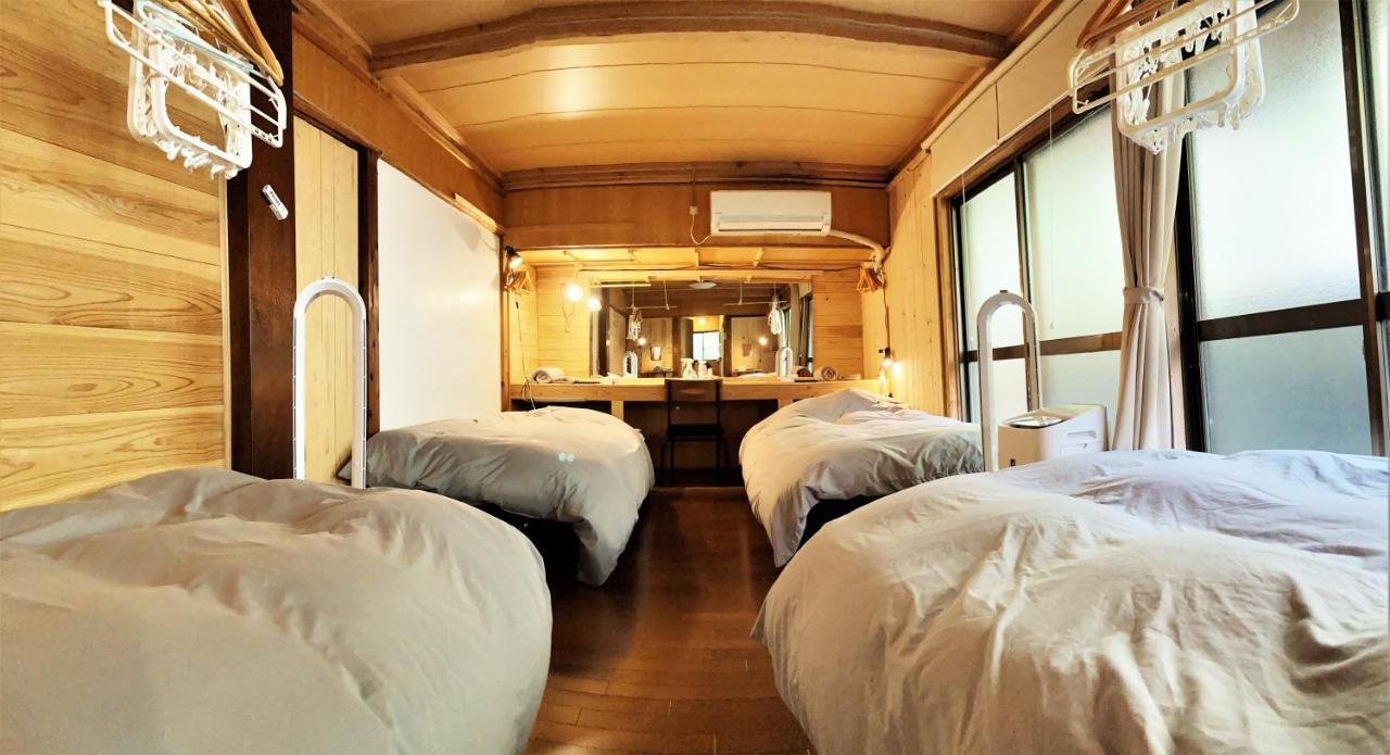 奄美ゲストハウス Hub A Nice Inn Setouchi  Экстерьер фото