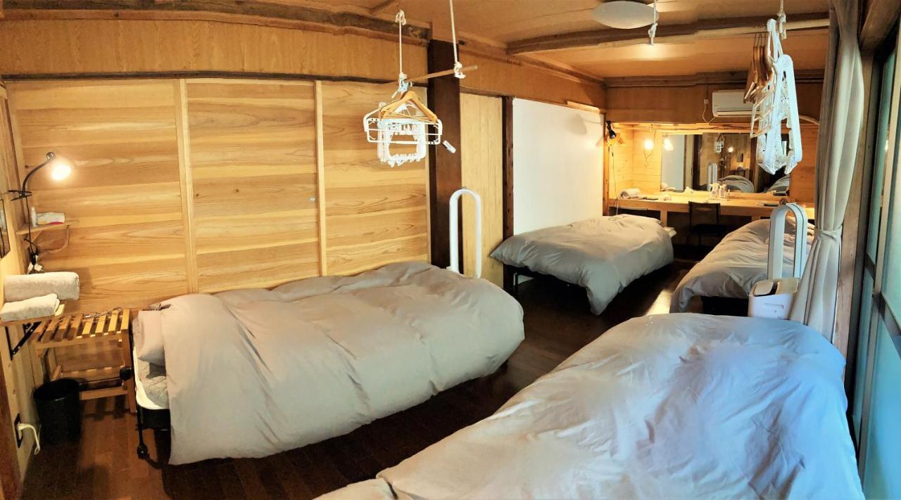 奄美ゲストハウス Hub A Nice Inn Setouchi  Экстерьер фото