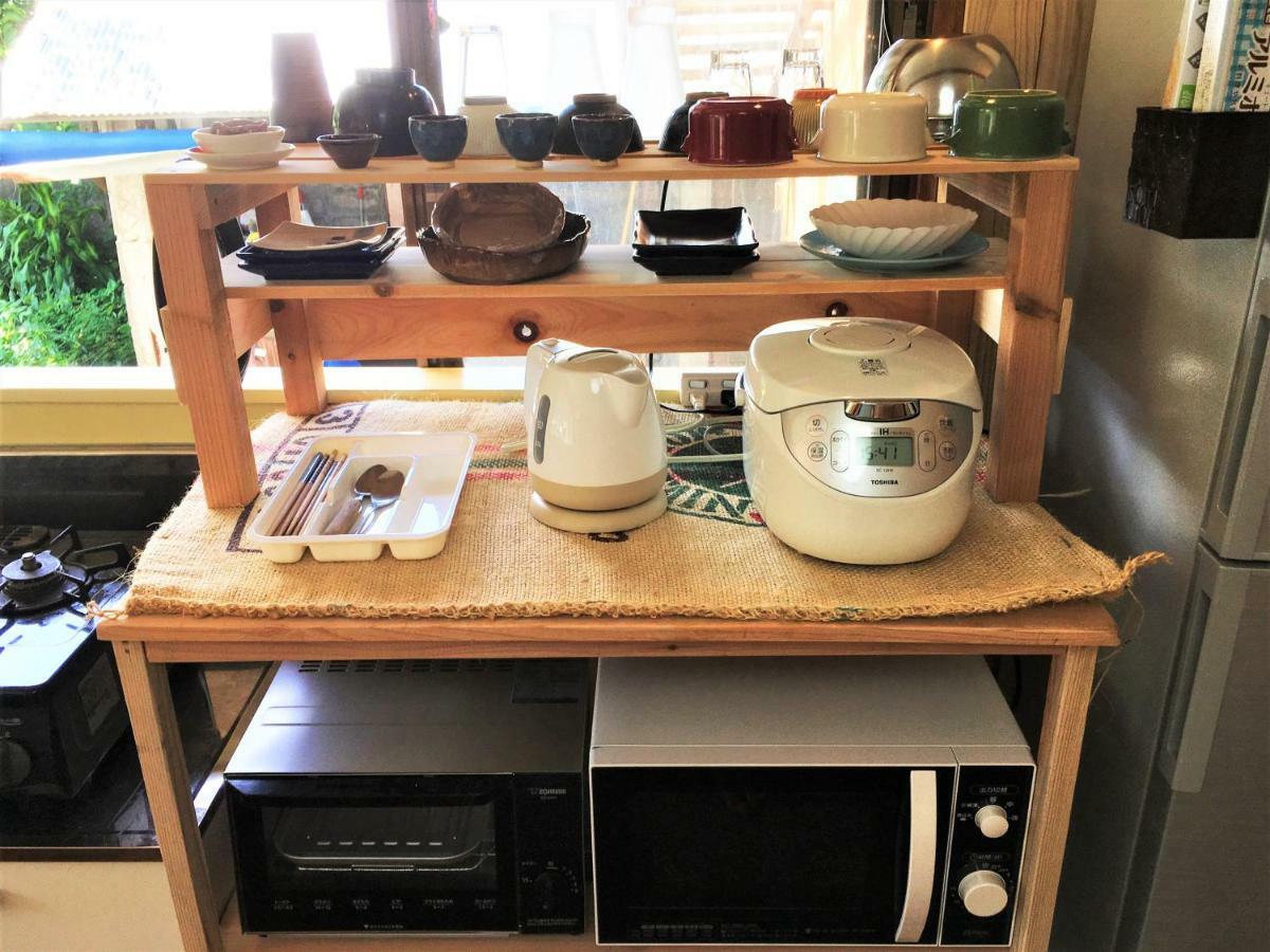 奄美ゲストハウス Hub A Nice Inn Setouchi  Экстерьер фото